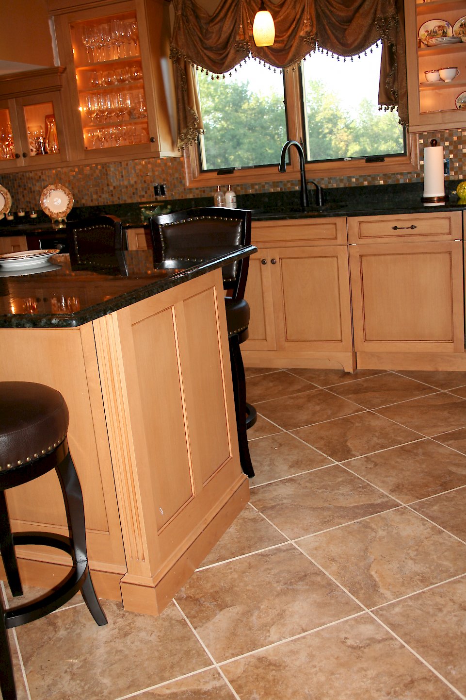 View of the side and floor molding on the island.