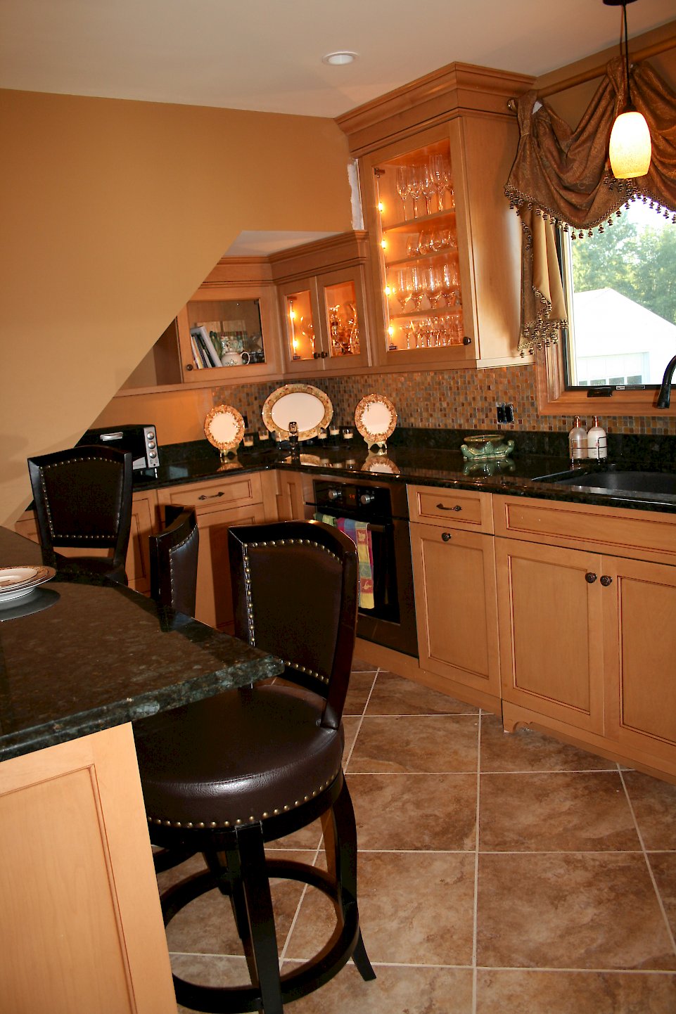 Far view of the upper cabinets lit up.