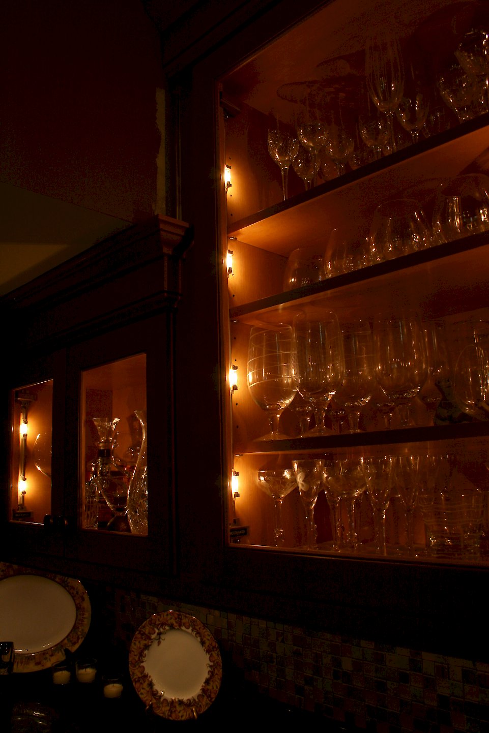 The cabinet lighting with the lights off.