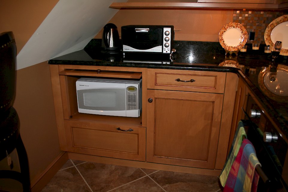 Flipper door for hiding small appliances.