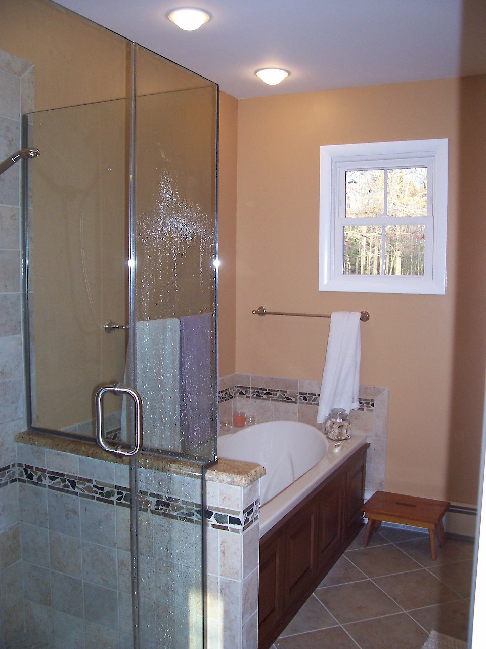 Bain Ultra tub next to the shower.