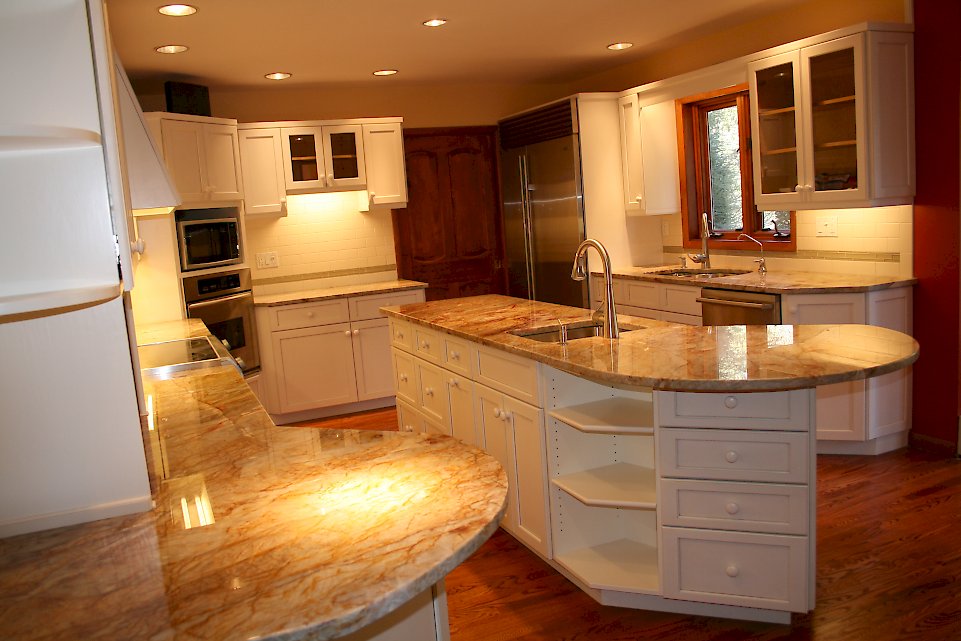 The Sub-Zero BI-48S/S/TH stainless refrigerator on the opposite wall.