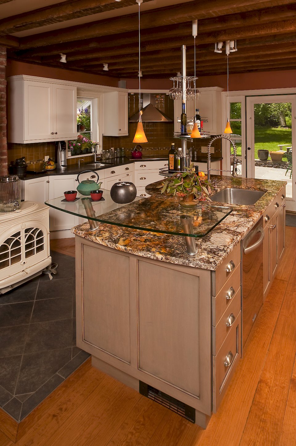 Harbor mist finish on the kitchen island Nordic White on the parimeter.