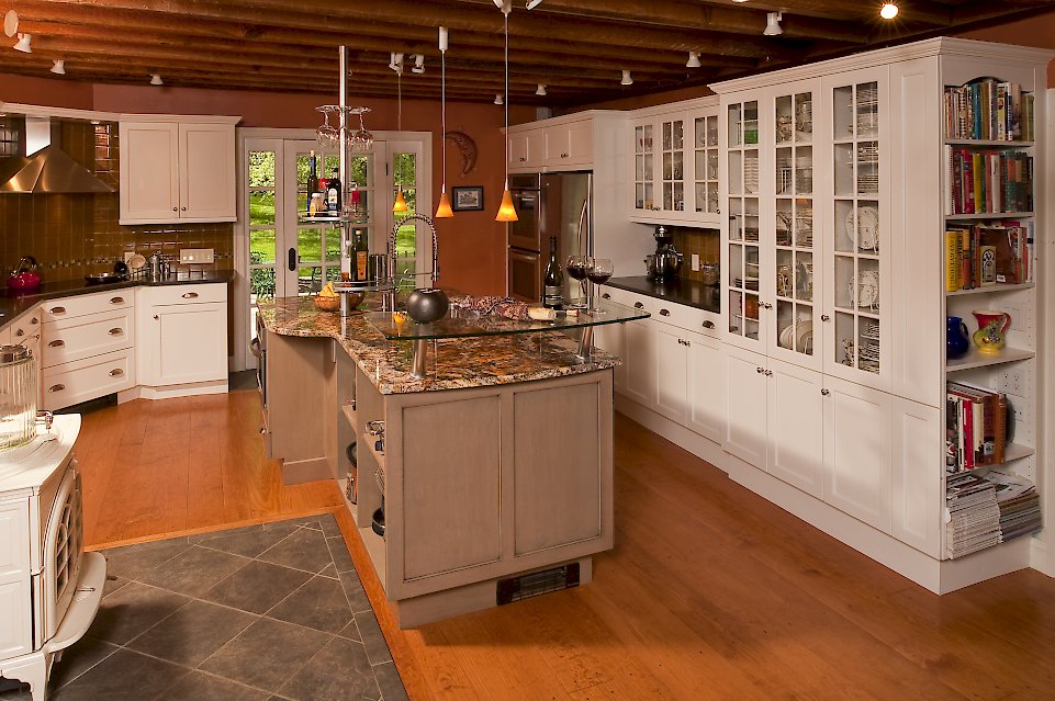 Open shelving on the end tall cabinet.
