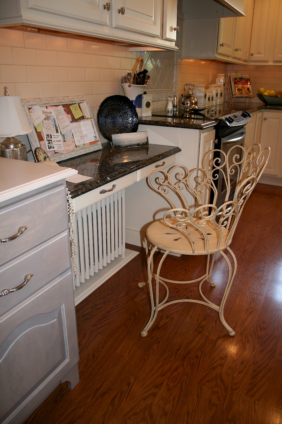 Desk between the hutch and the kitchen.