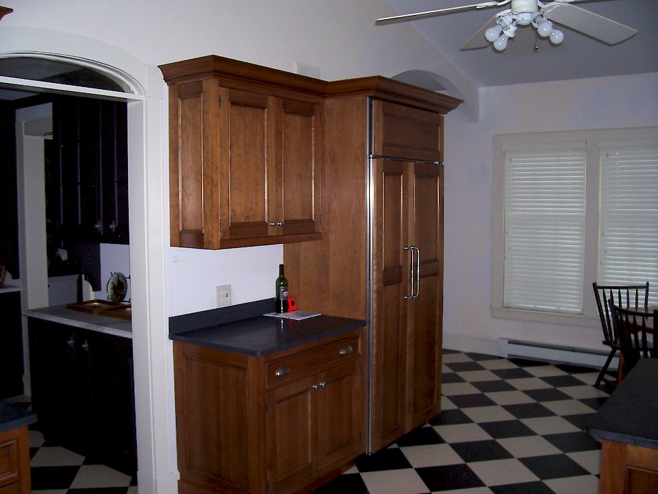 A Sub-Zero 661/O refrigerator with natural cherry panels.