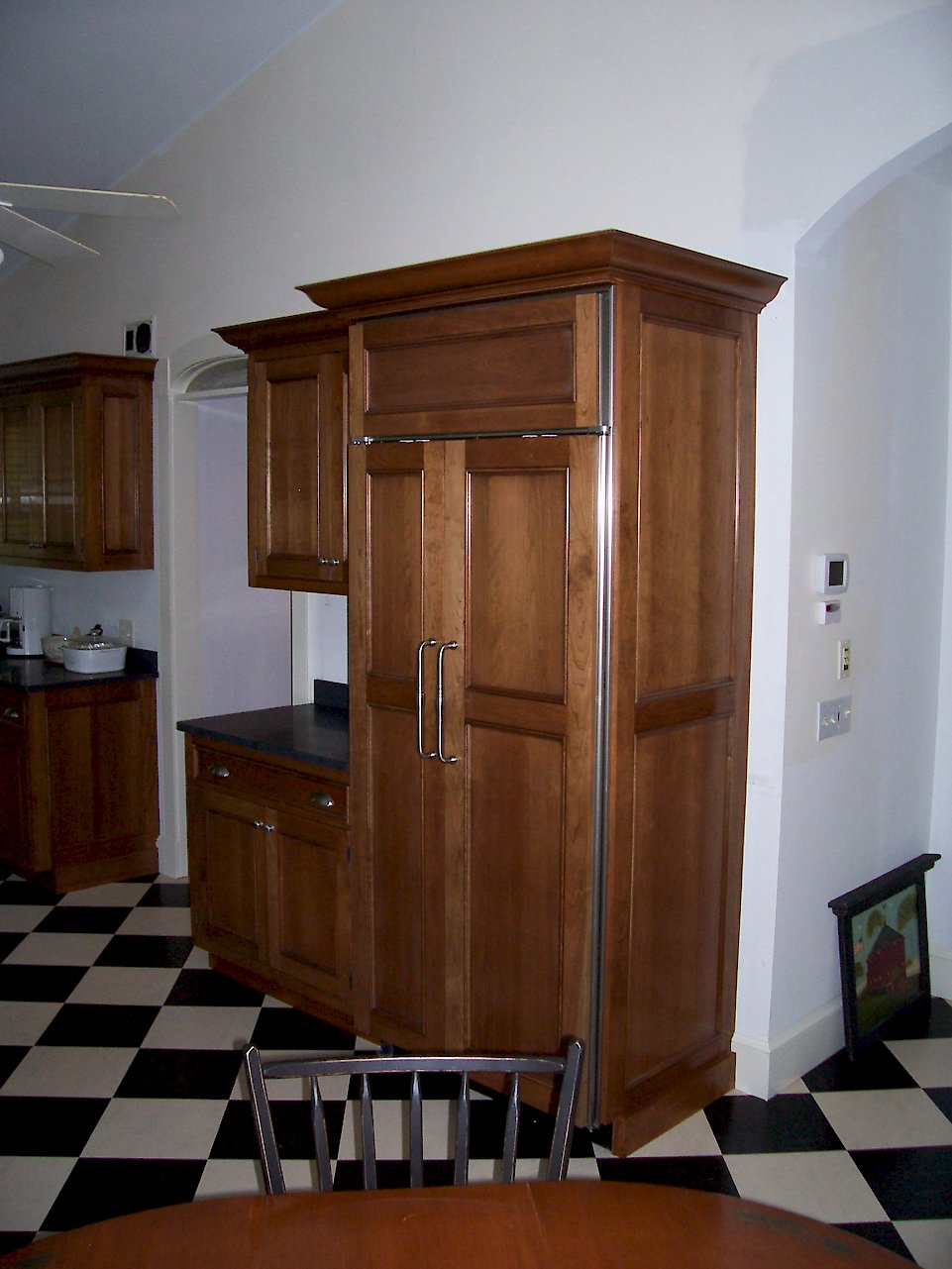 Natural cherry refrigerator side panel.