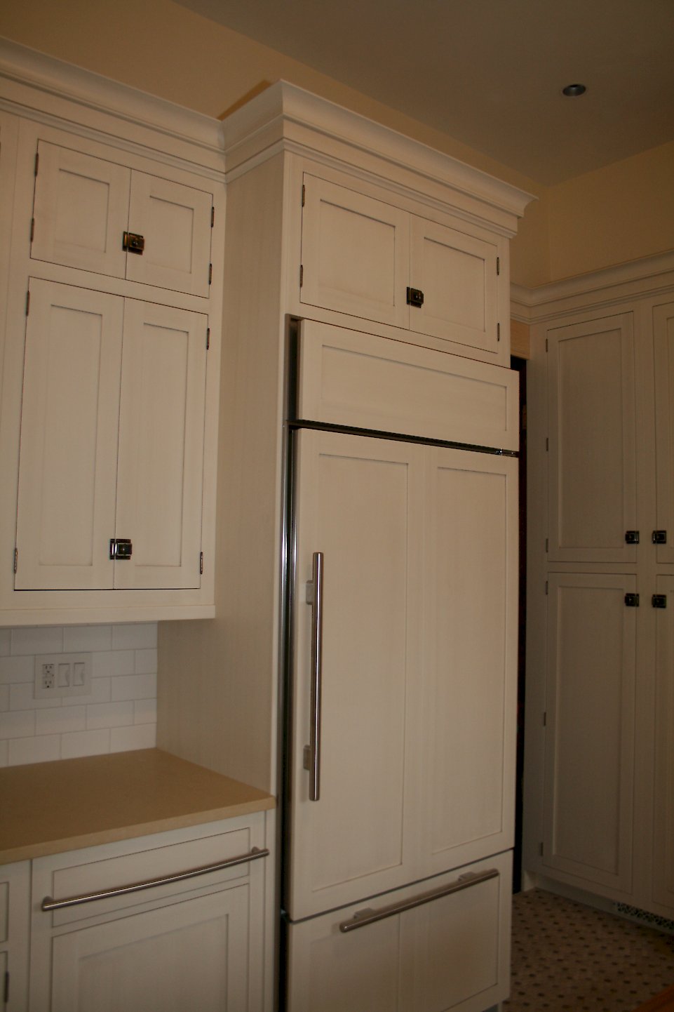 Custom paneled refrigerator.