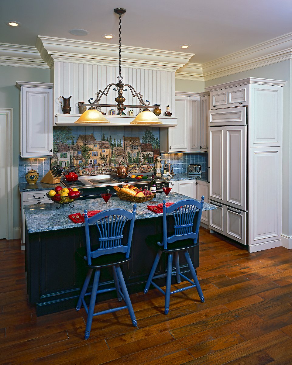 A Wood paneled Sub-Zero 650/O refrigerator.
