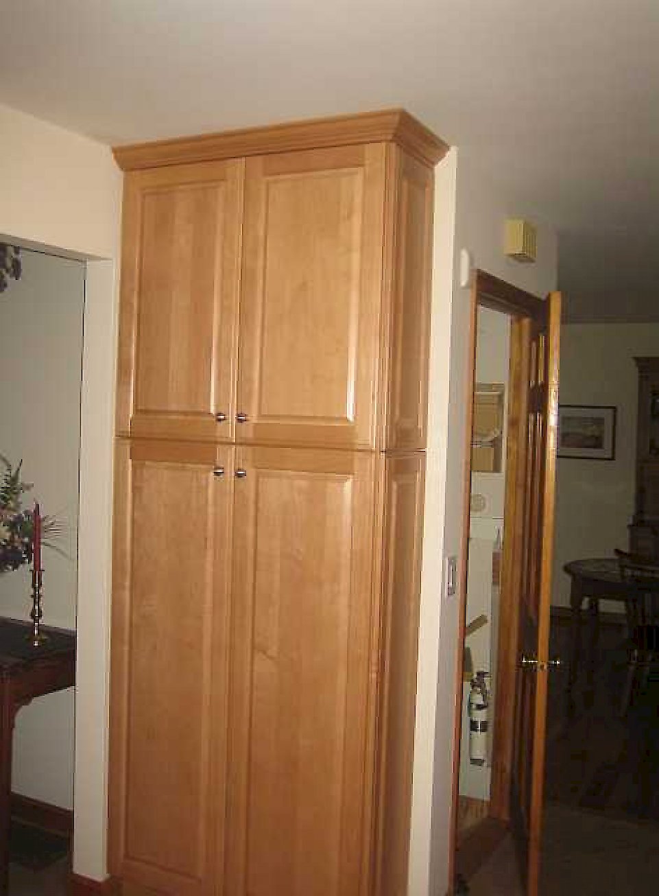 The tall pantry cabinet.