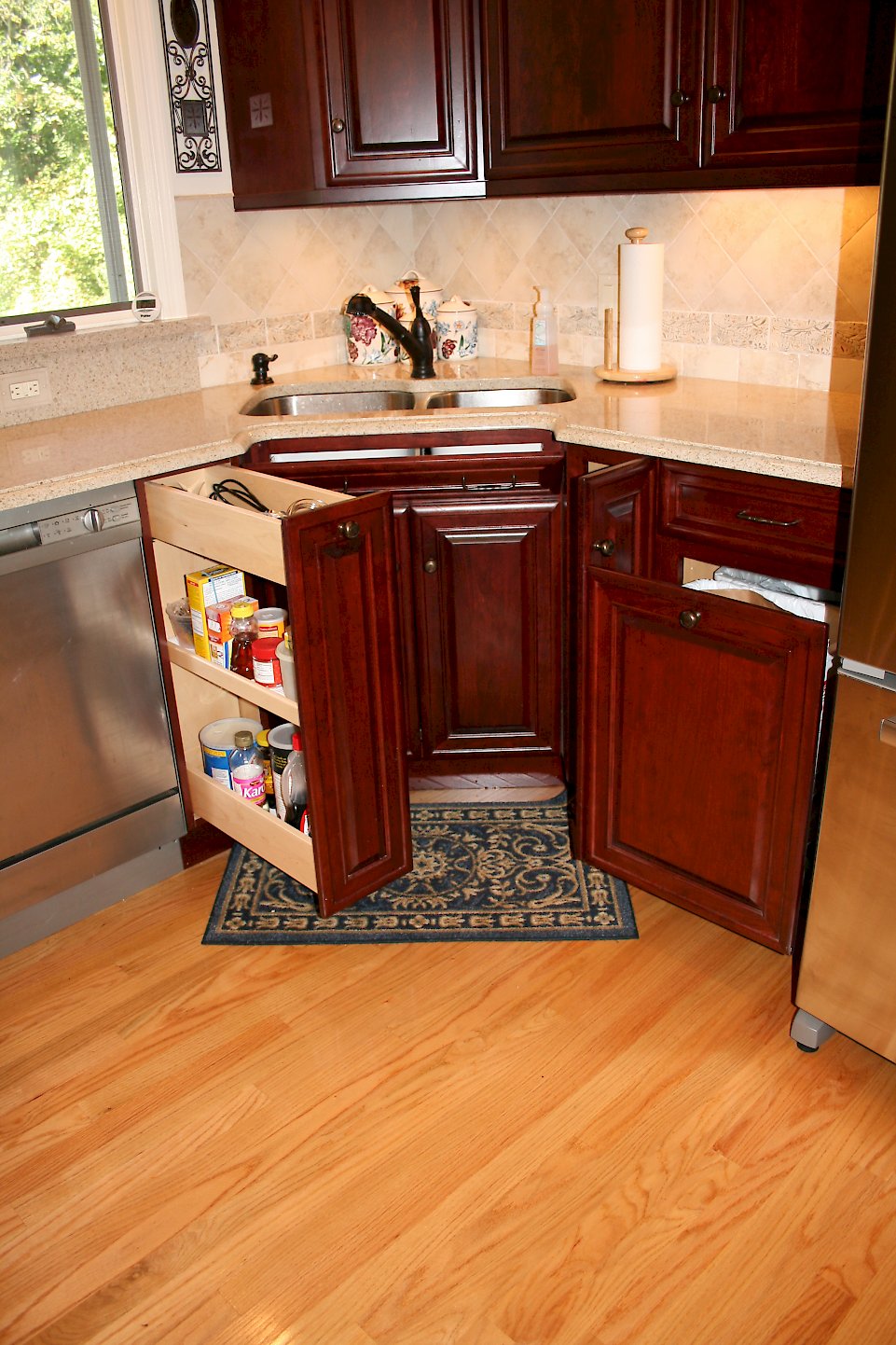 Double trash pull-out and storage next to the sink.
