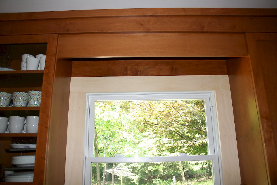 Crown molding near the window.