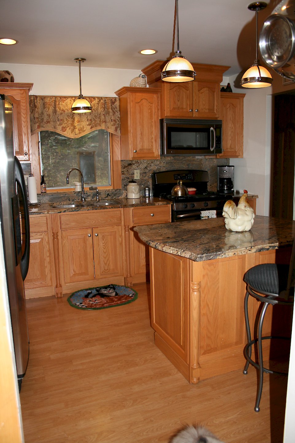 Honey Oak Kitchen with full height back-splash.