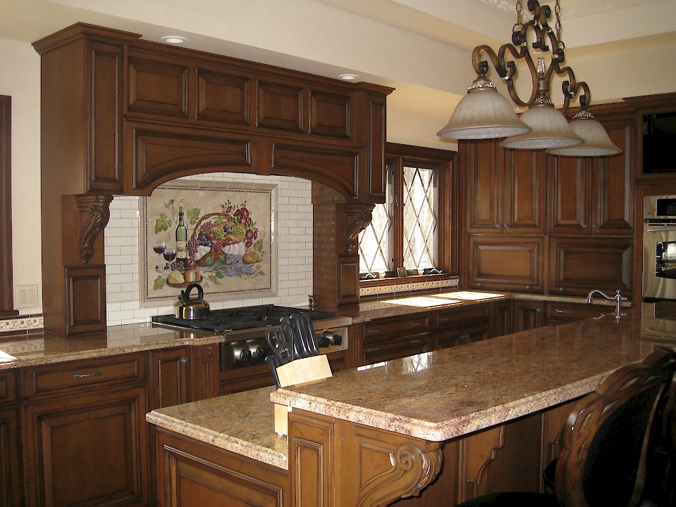 Wood-Mode kitchen with an Oxford finish and Barcelona Raised door style.