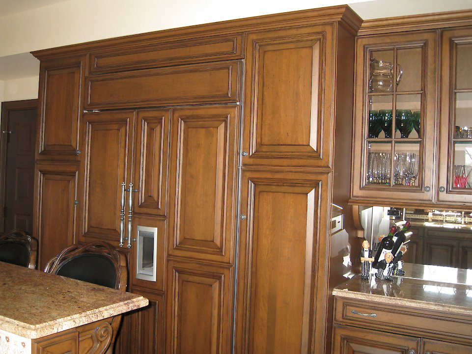 A wood paneled Sub-Zero BI48SDIO.