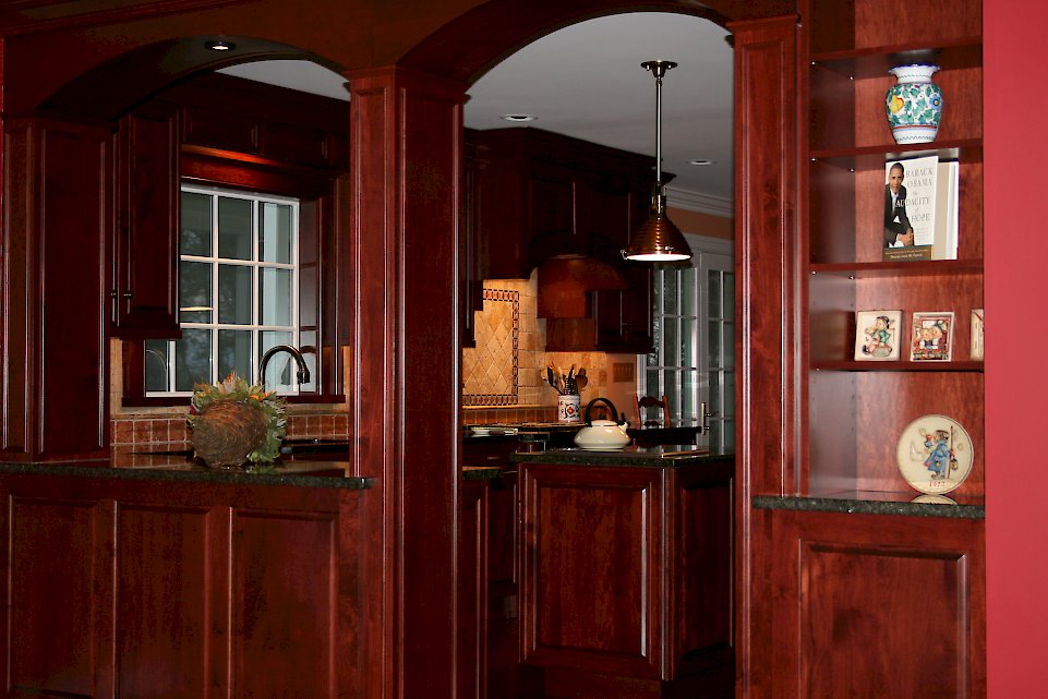 The arched doorway entering the kitchen area.