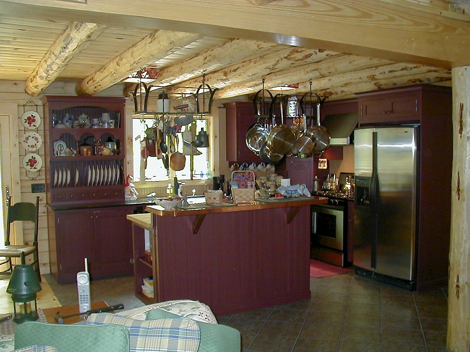 A custom copper and maple boos counter-top on the island.