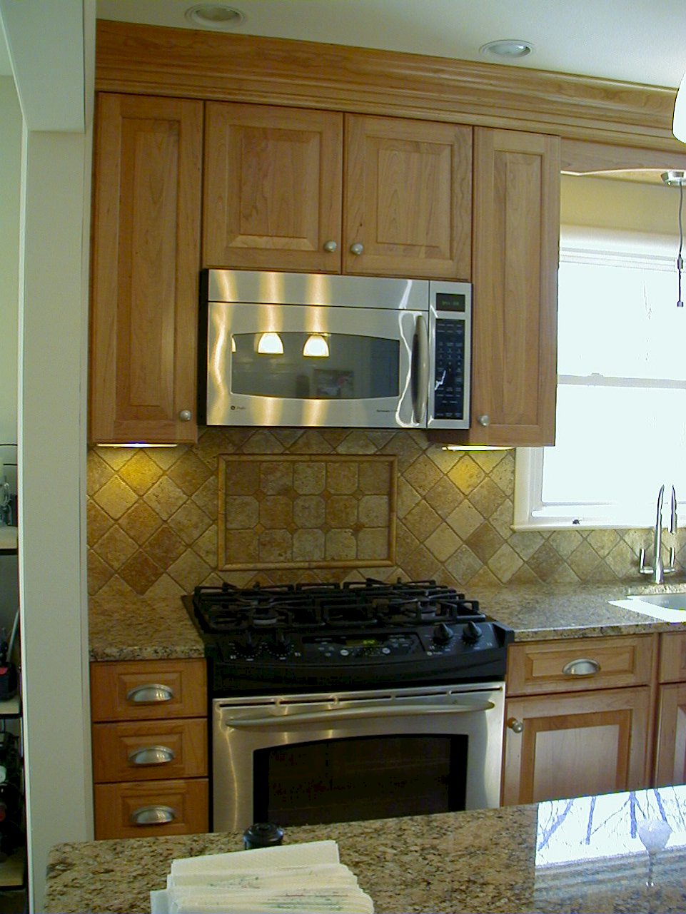 GE microwave and gas range.