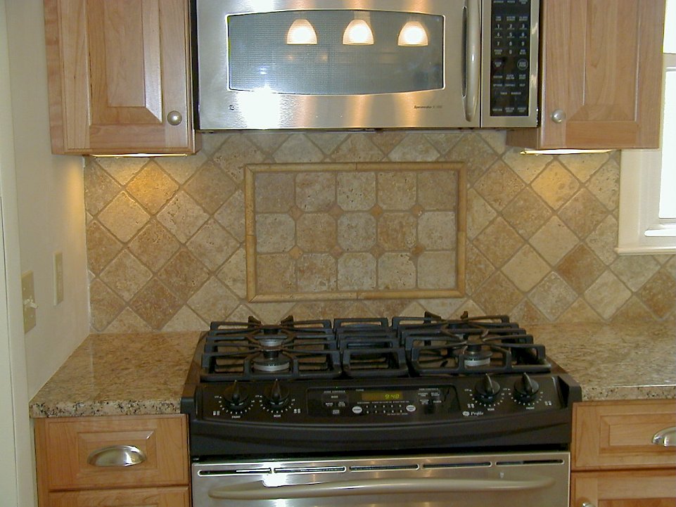 Closer view of the custom tiled backsplash.