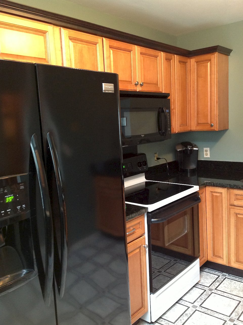 An under-cabinet microwave/hood over the range.