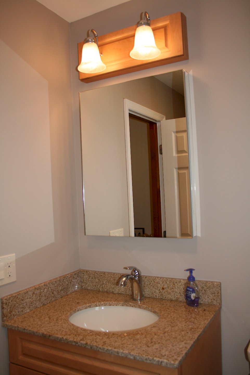Closer view of the medicine cabinet.