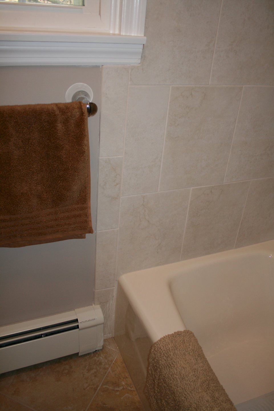 Close view of the tile on the shower walls.