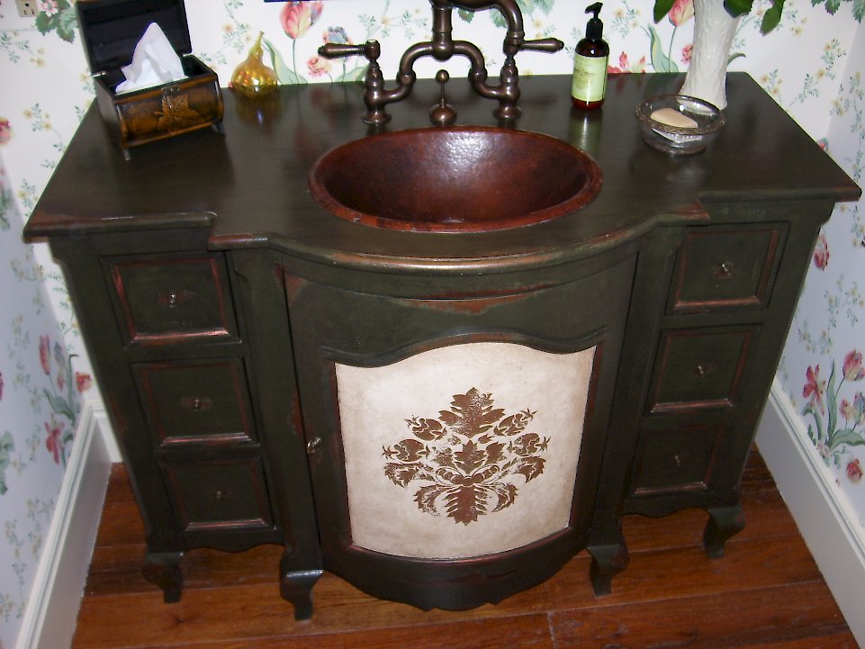 Vanity Flair vanity with copper accents.