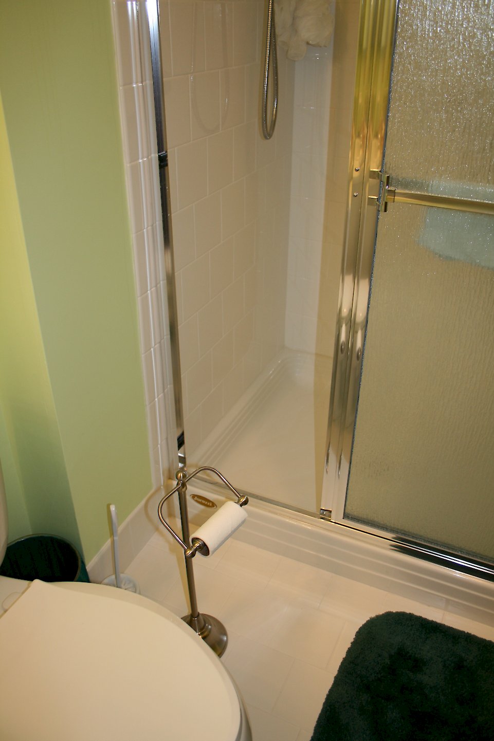 American Olean Designer white tile on the walls.