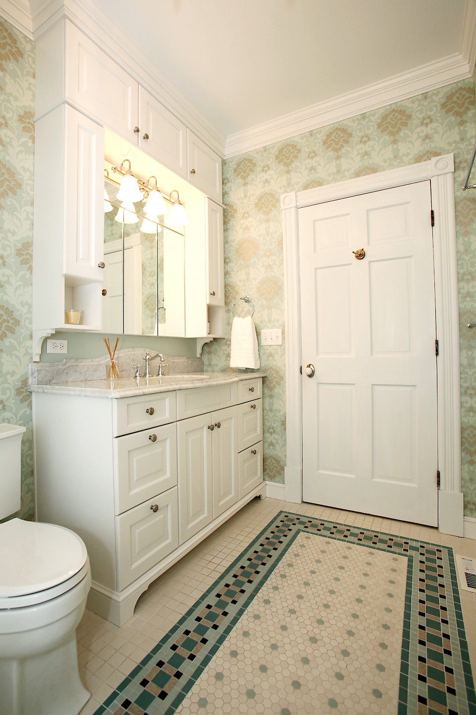 View of the cabinetry to the ceiling.
