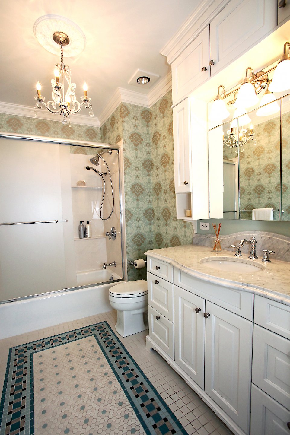 View of the Kohler toilet next the vanity.