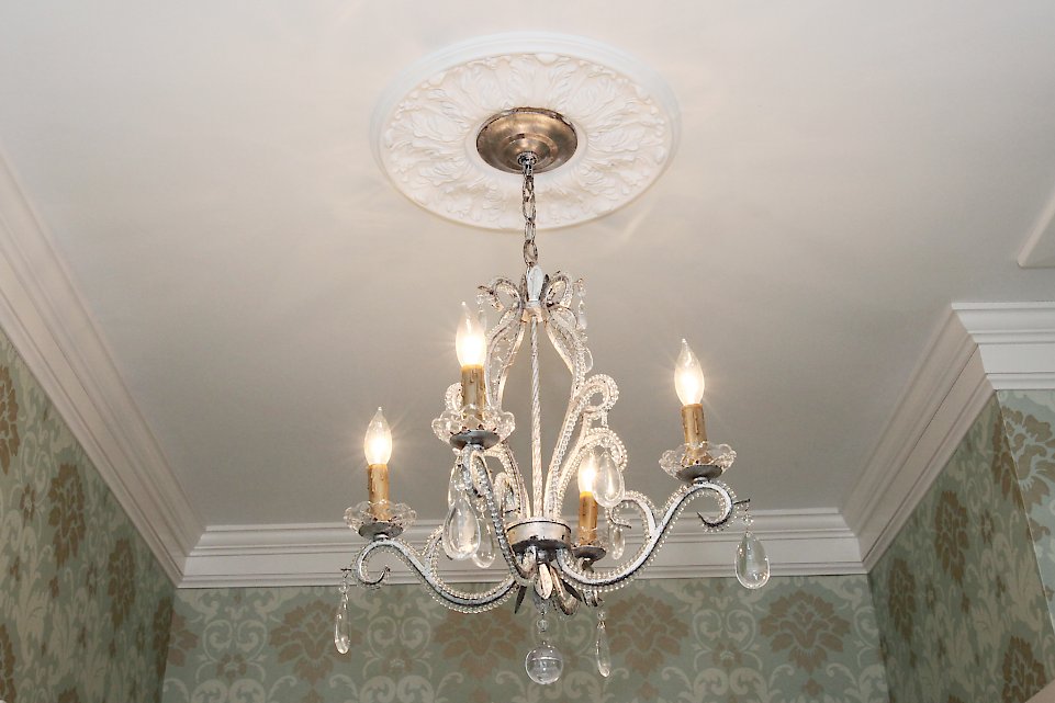 Chandelier in the bathroom.